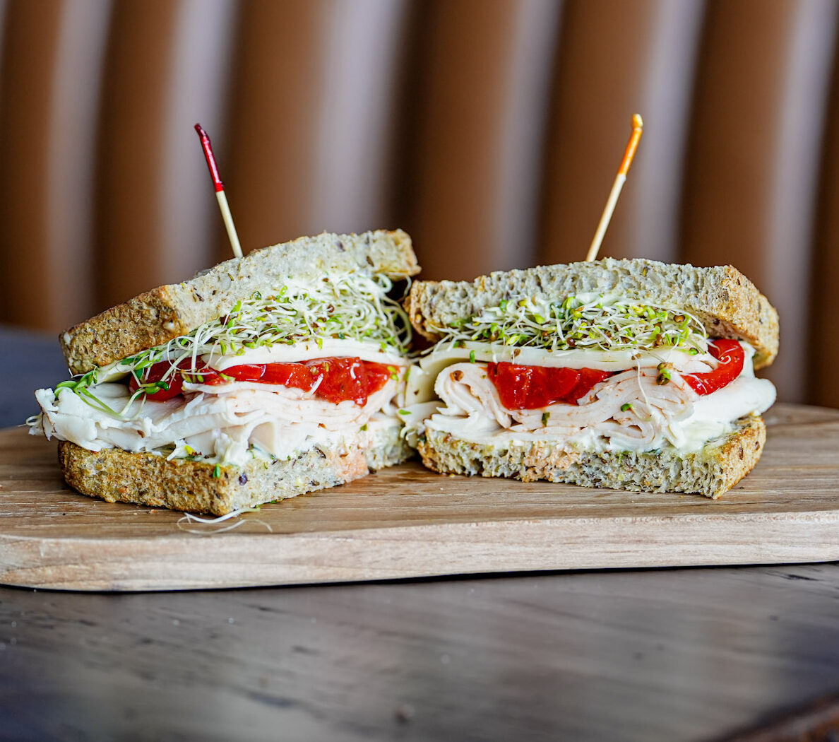 Riverside Picnic sandwich on toasted multigrain with chicken, provolone, sprouts and roasted red peppers